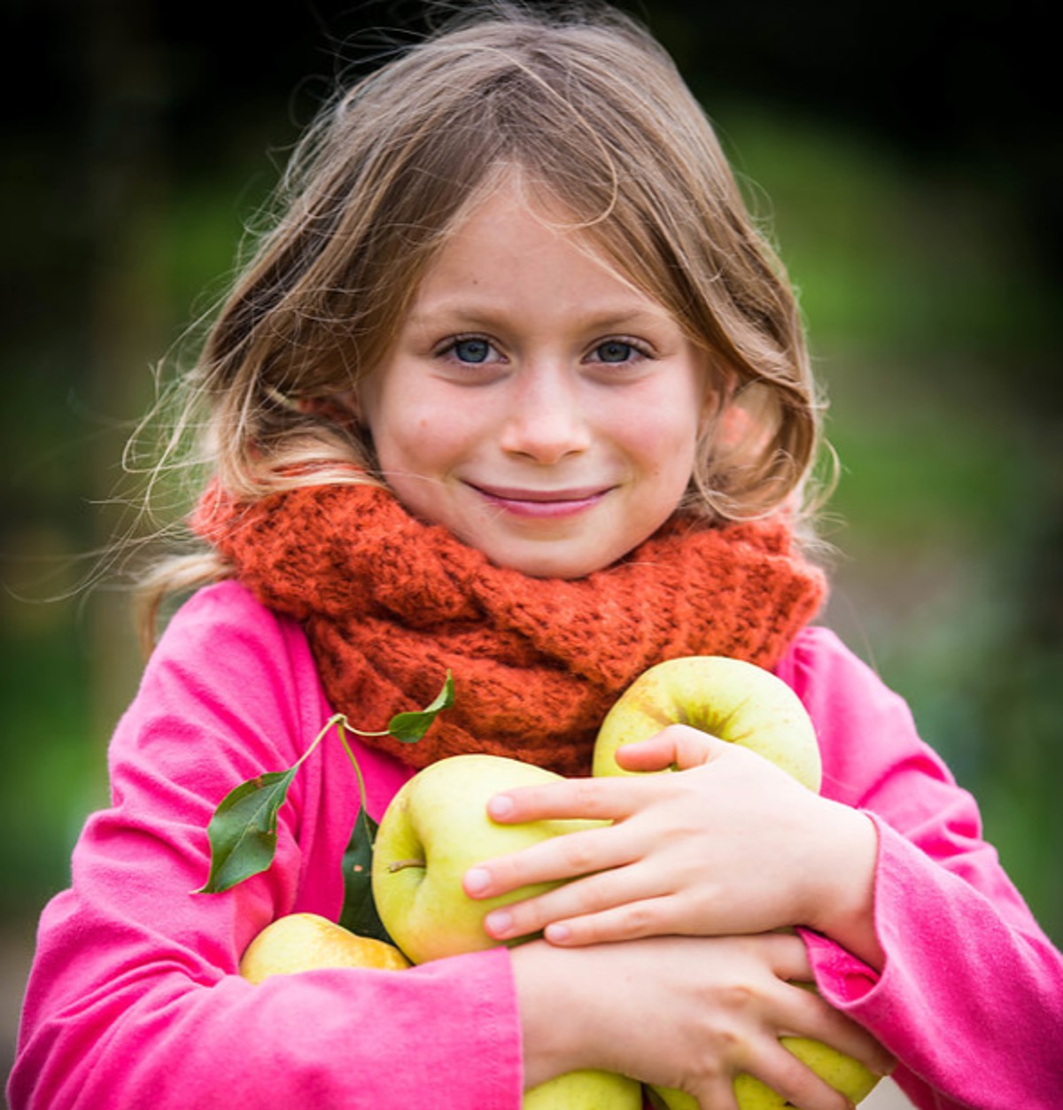 Kid with apples